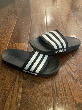 adidas Black Slide Sandals with White Stripes, Boy’s Size 4. Good condition.